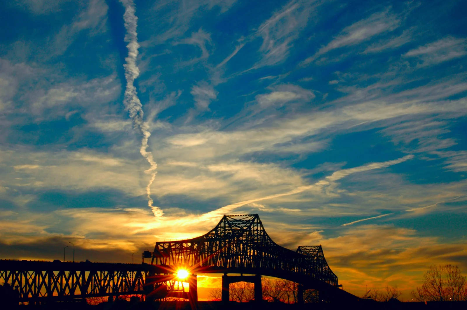 The Horace Wilkinson Bridge over the Mississippi River at sunset in Baton Rouge