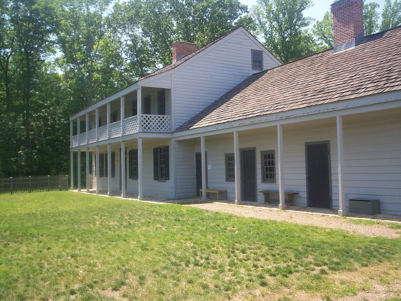 The white clapboard house and two-story porch at Rockingham State Historic Site